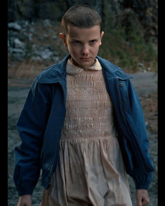 eleven pink dress blue jacket Stranger Things Fans React to 'Sexy Eleven' Halloween Costume That's for Sale